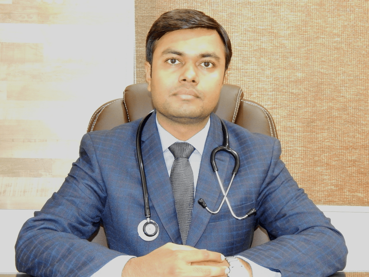 Best Diabetologist & Metabolic Physician in blue suit with stethoscope